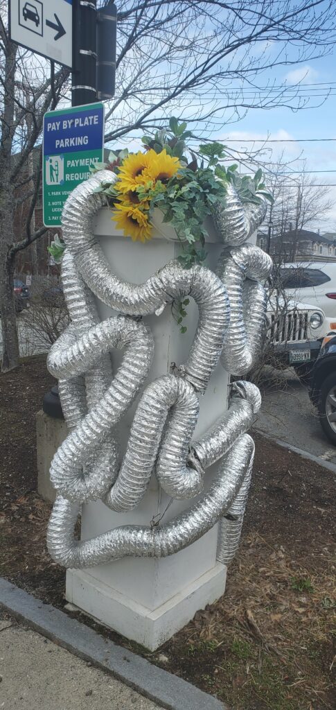 Photos of various painted boxes surrounding parking kiosk machines in downtown Bar Harbor, Maine.  All within walking distance of the Saltair Inn Waterfront Bed and Breakfast